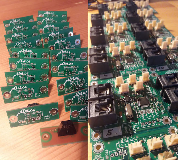 Both PCBs. Smaller IR board on the left and main board on the right.