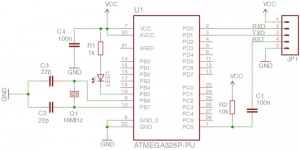 Arduino kompatibilní obvod s minimálním počtem součástek na nepájivém poli.